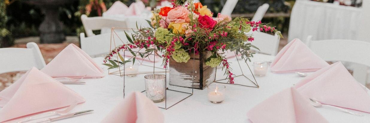 Table arrangement in New Orleans Rehearsal Dinner